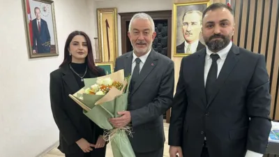 Isparta Müteahhitler Birliği Başkanı Ali Yüce ve yönetim kurulu üyeleri,